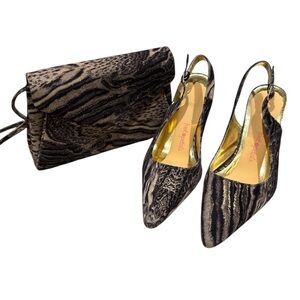 Especially Yours boutique heels with matching purse. Used size 8